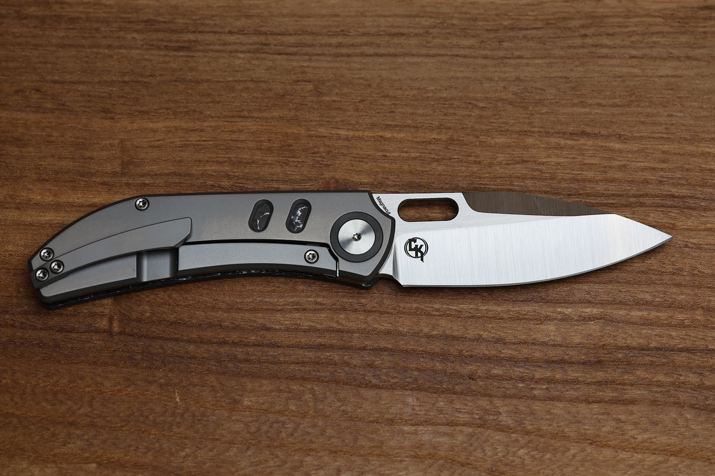 YAN’S CHEVRON- TITANIUM FRONT FLIPPER WITH NEBULA CF THUMB HOLE