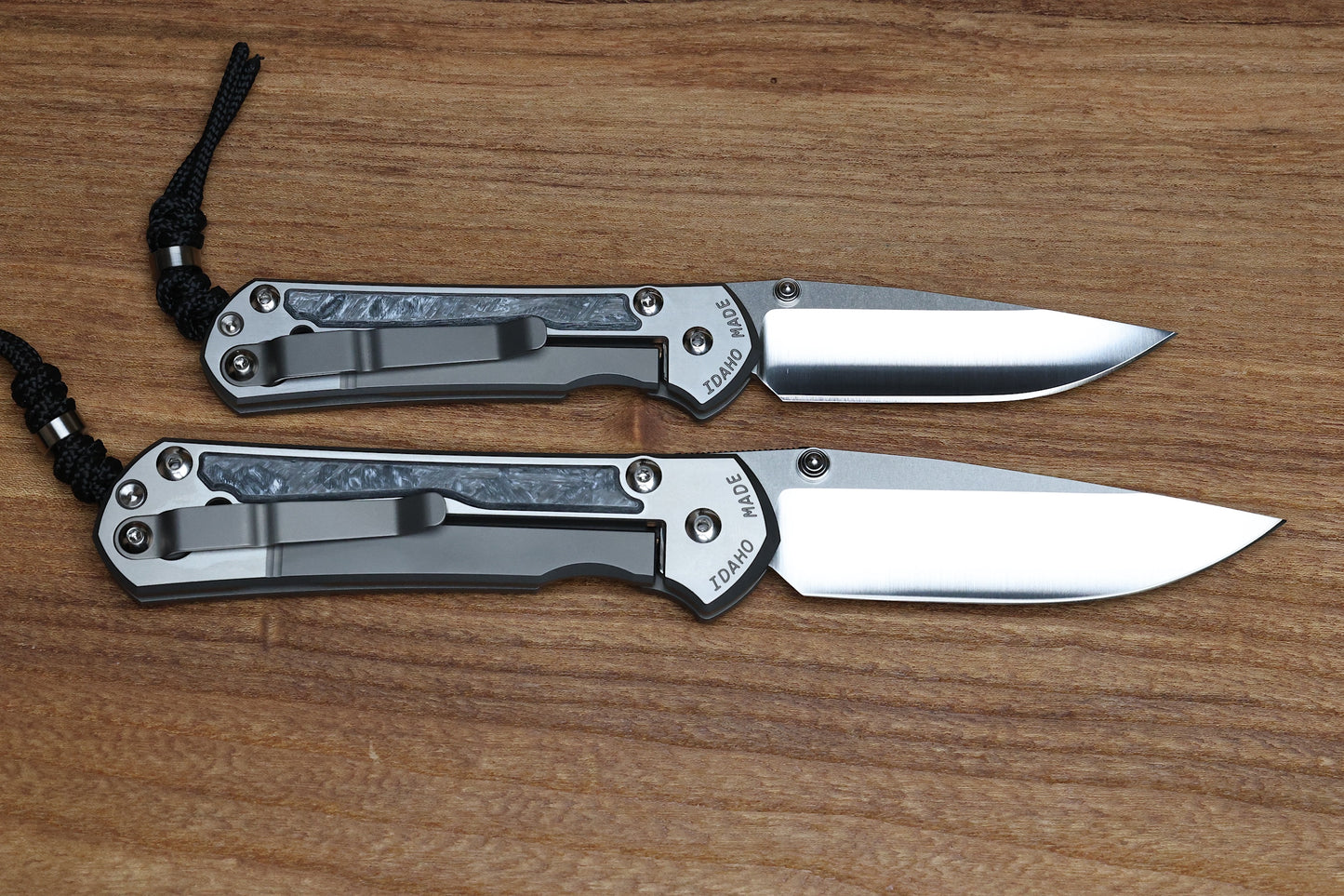 CHRIS REEVE LARGE & SMALL SEBENZA 31 NUMBERED MATCHED SET - WHITE CARBOTI INLAY - POLISHED DROP POINT CPM MAGNACUT BLADE - SILVER DOUBLE LUGS