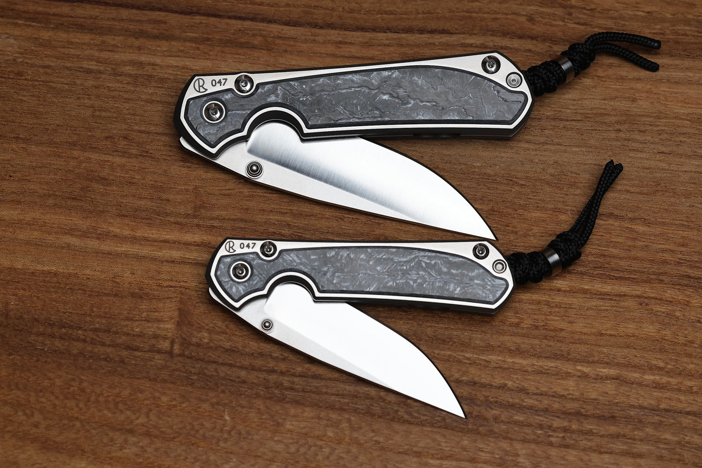 CHRIS REEVE LARGE & SMALL SEBENZA 31 NUMBERED MATCHED SET - WHITE CARBOTI INLAY - POLISHED DROP POINT CPM MAGNACUT BLADE - SILVER DOUBLE LUGS