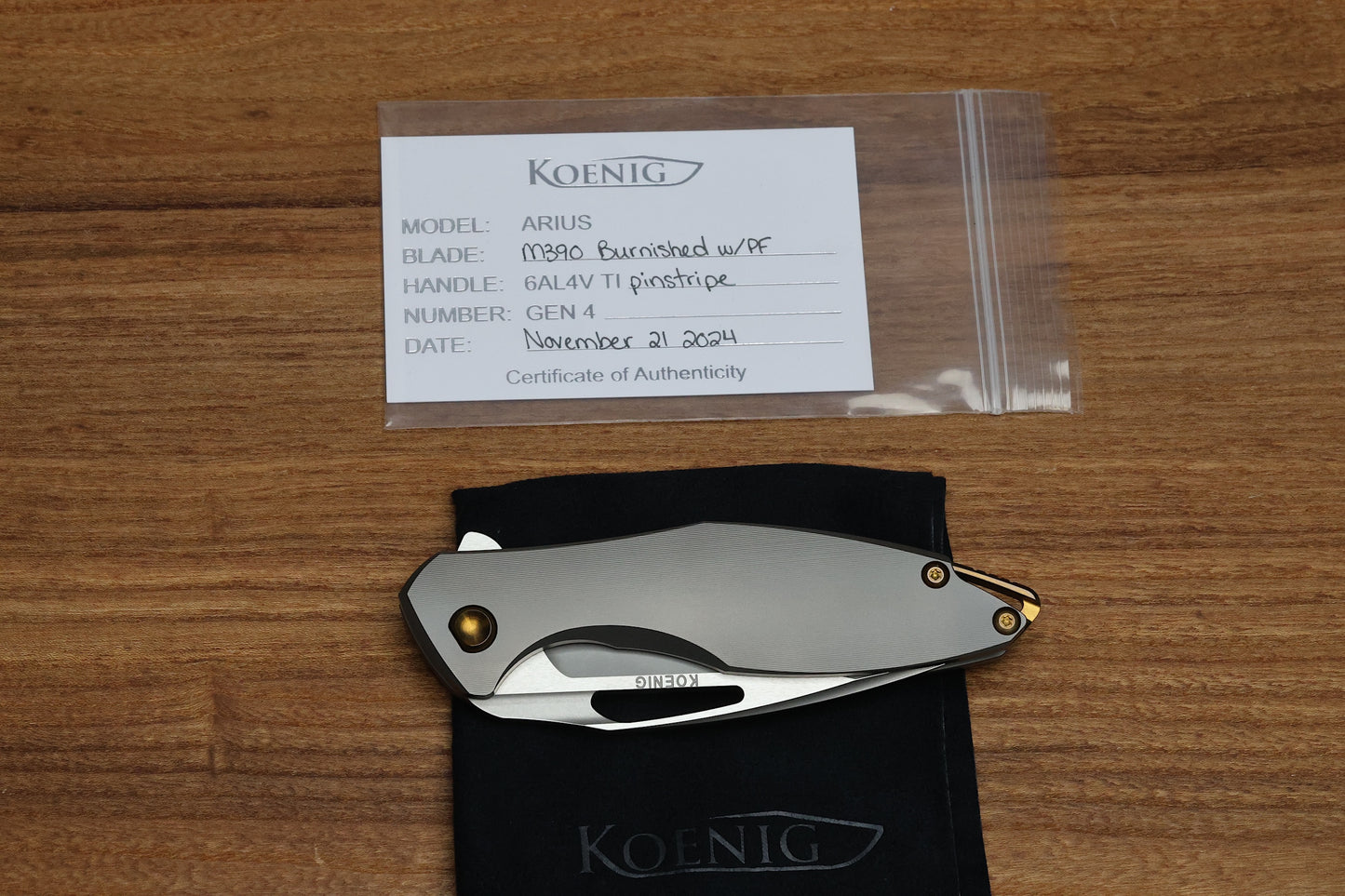 KOENIG KNIVES ARIUS - PINSTRIPE TITANIUM HANDLE - BRONZE HARDWARE - BURNISHED W/ POLISHED FLATS M390 BLADE