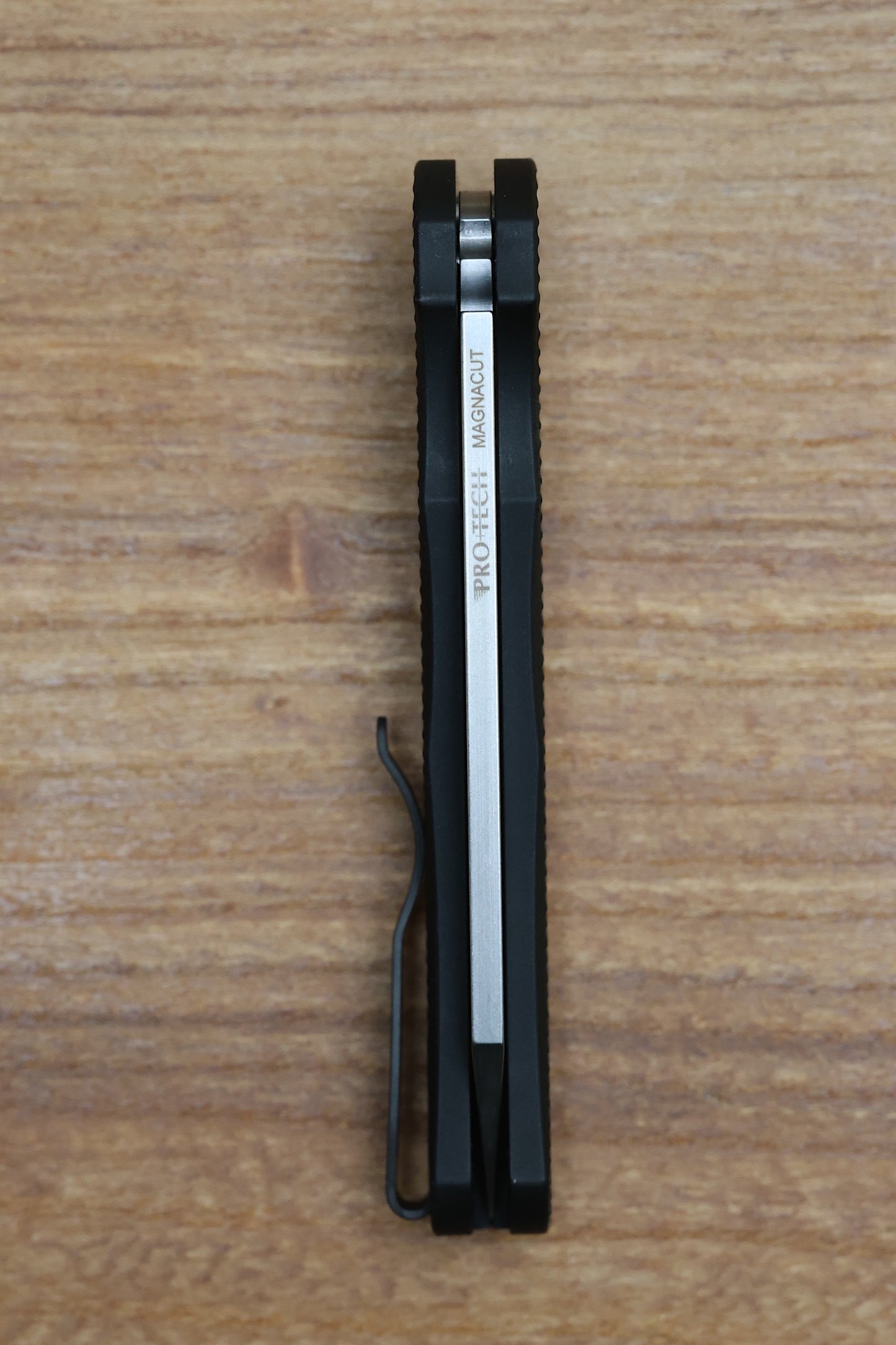 PRO-TECH MALIBU TEXTURED BLACK HANDLE & STONEWASH MAGNACUT REVERSE TANTO BLADE 5405