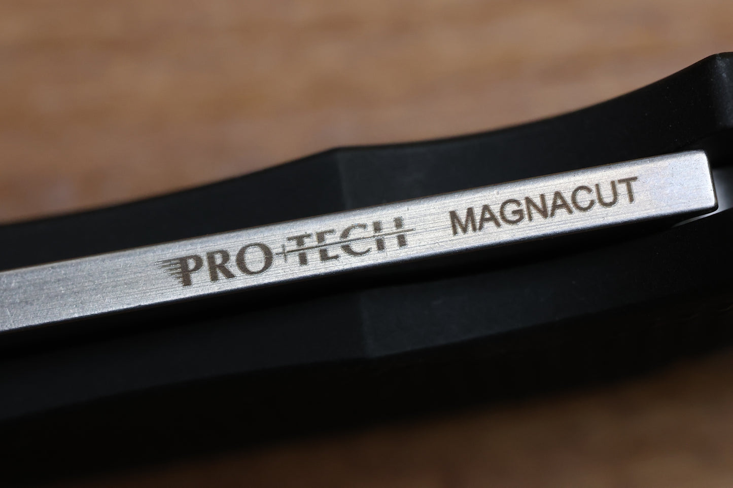 PRO-TECH MALIBU TEXTURED BLACK HANDLE & STONEWASH MAGNACUT REVERSE TANTO BLADE 5405