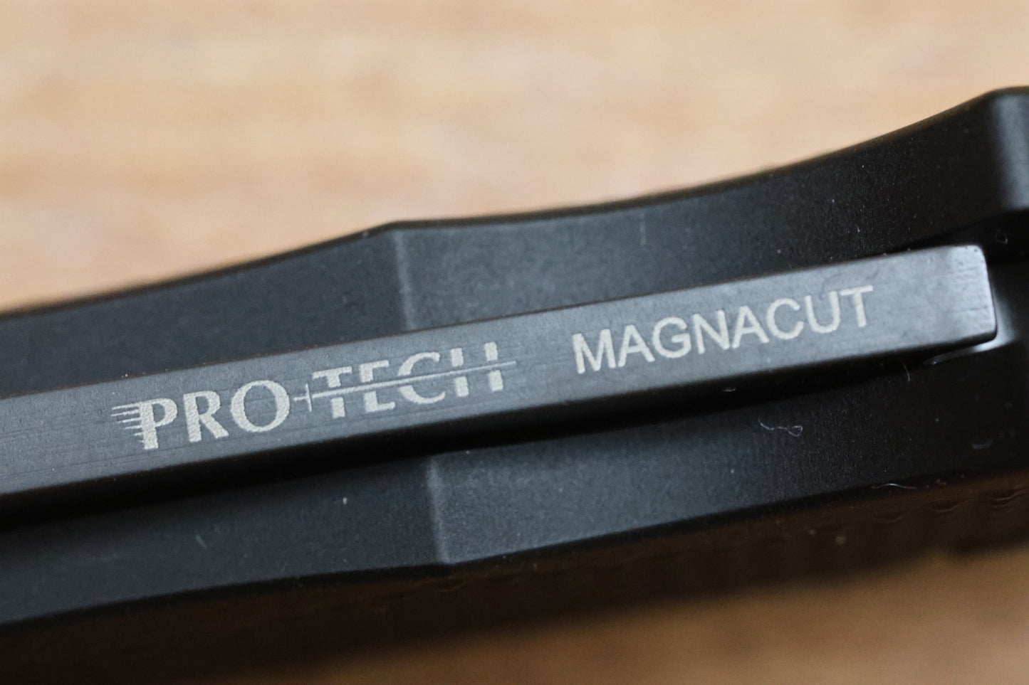 PRO-TECH MALIBU TEXTURED BLACK HANDLE & DLC MAGNACUT REVERSE TANTO BLADE 5406