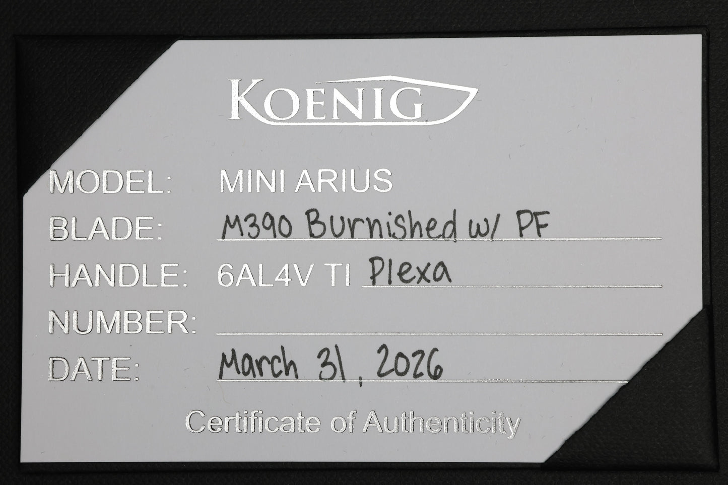 KOENIG MINI ARIUS - PLEXA TITANIUM HANDLE - BLUE HARDWARE - BURNISHED W/ POLISHED FLATS M390 BLADE