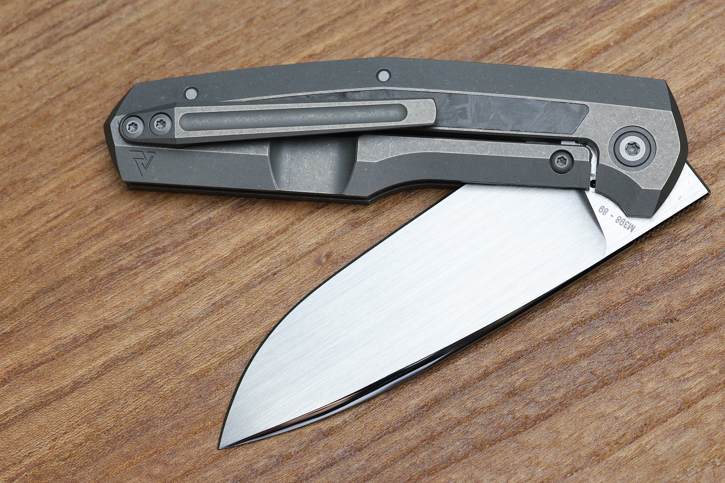CUSTOM KNIFE FACTORY FIF18 TUMBLED TITANIUM HANDLES W/ CARBON FIBER INLAY & M398