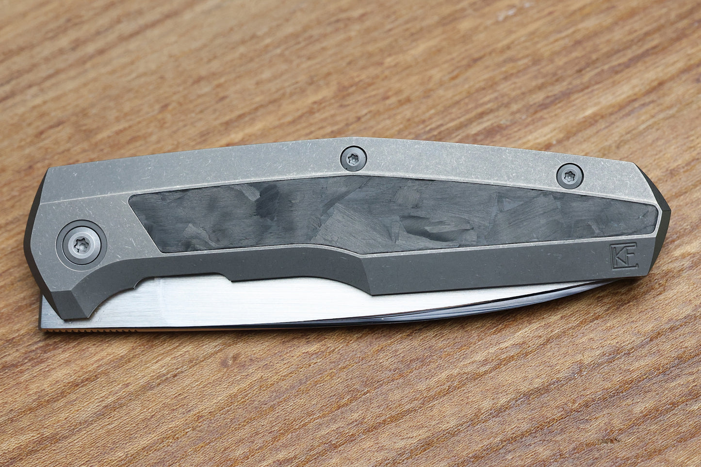 CUSTOM KNIFE FACTORY FIF18 TUMBLED TITANIUM HANDLES W/ CARBON FIBER INLAY & M398