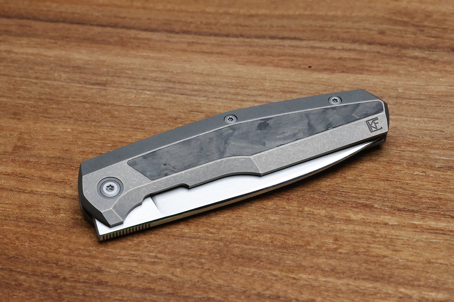 CUSTOM KNIFE FACTORY FIF18 TUMBLED TITANIUM HANDLES W/ CARBON FIBER INLAY & M398