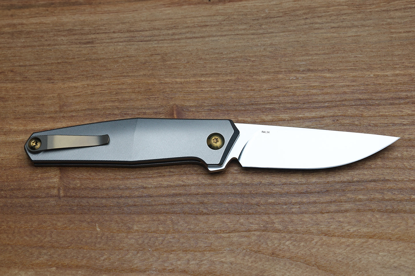 ANSO OF DENMARK - TOKO - GREY/AMBER ANO TITANIUM HANDLE - RWL34 BLADE