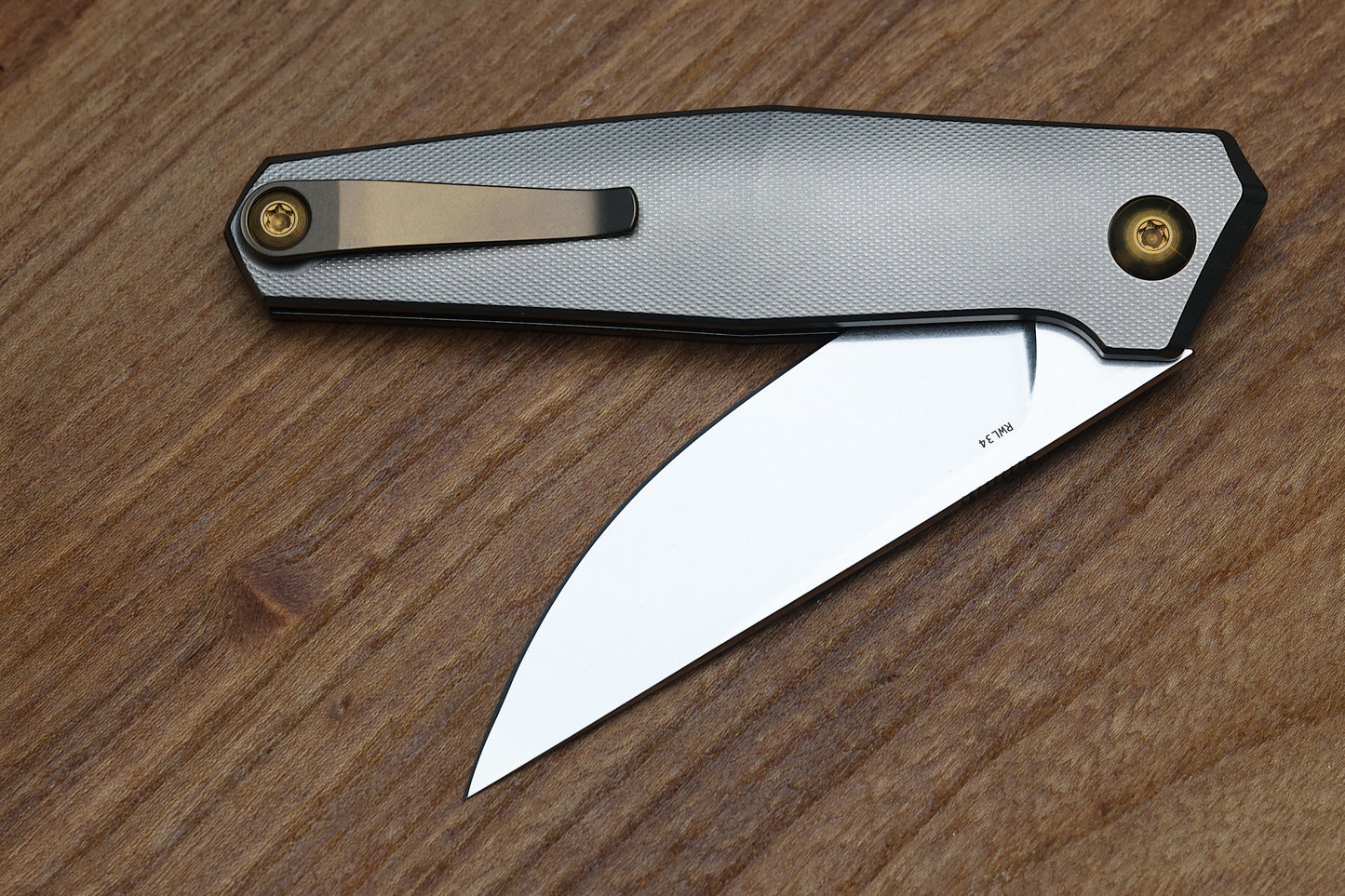 ANSO OF DENMARK - TOKO - GREY/AMBER ANO TITANIUM HANDLE - RWL34 BLADE