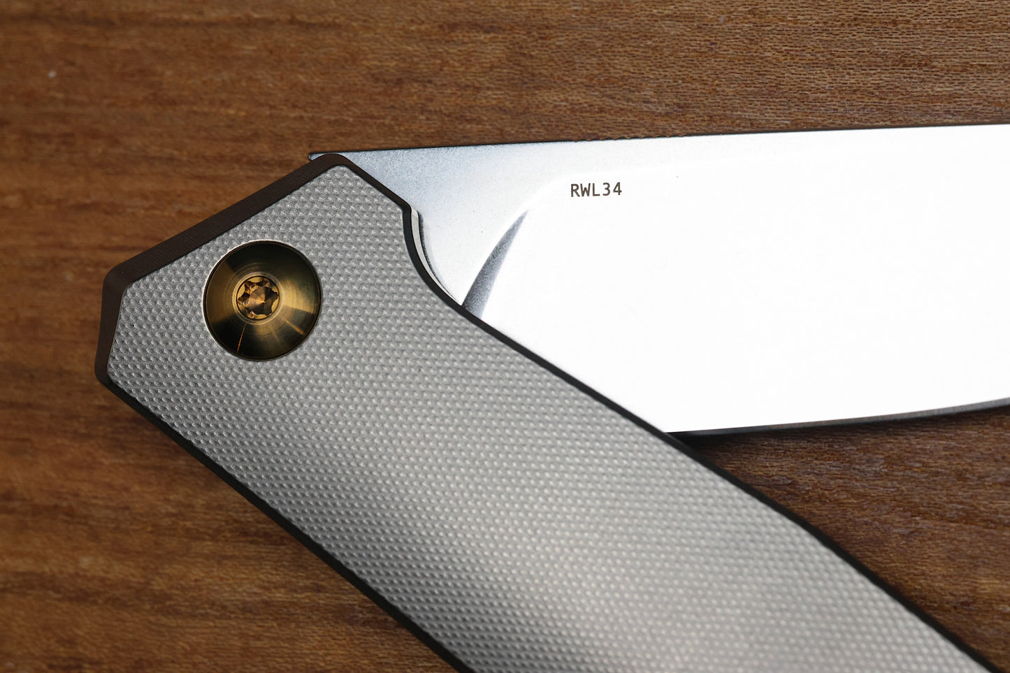 ANSO OF DENMARK - TOKO - GREY/AMBER ANO TITANIUM HANDLE - RWL34 BLADE