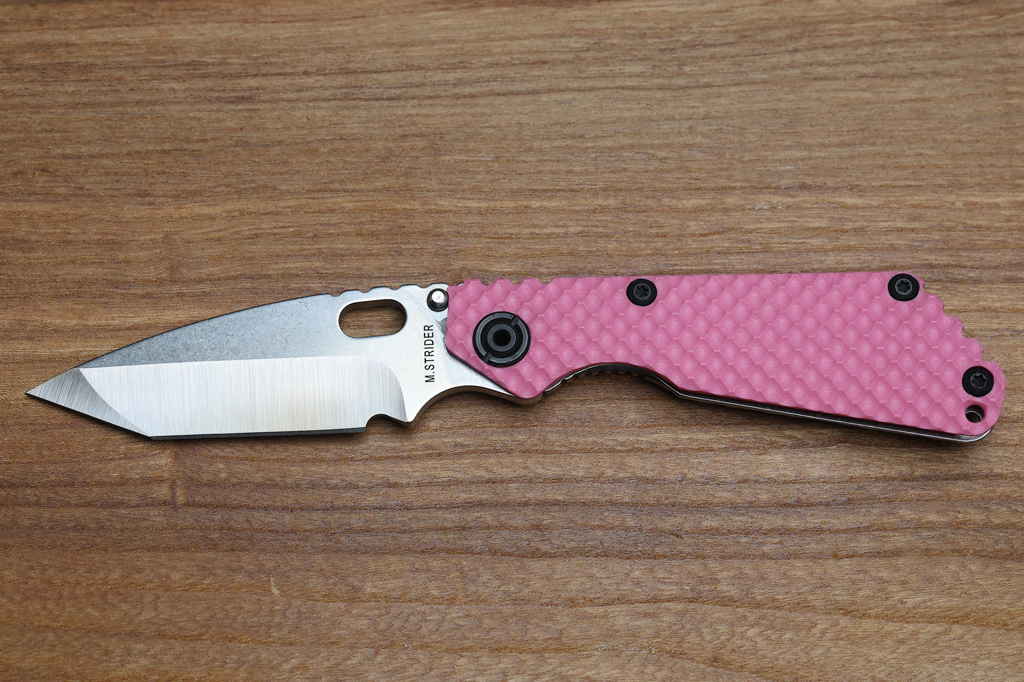 STRIDER KNIVES SNG TWO-TONE SATIN/ STONEWASHED MAGNACUT TANTO BLADE, PINK G10 GUNNER GRIP TOP, STONEWASHED GUNNER GRIP TITANIUM FRAME