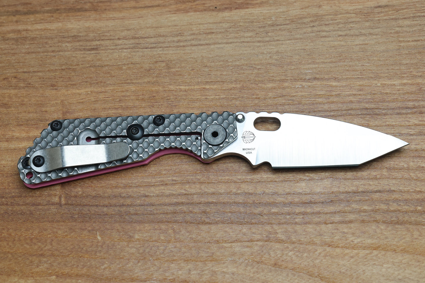 STRIDER KNIVES SNG TWO-TONE SATIN/ STONEWASHED MAGNACUT TANTO BLADE, PINK G10 GUNNER GRIP TOP, STONEWASHED GUNNER GRIP TITANIUM FRAME