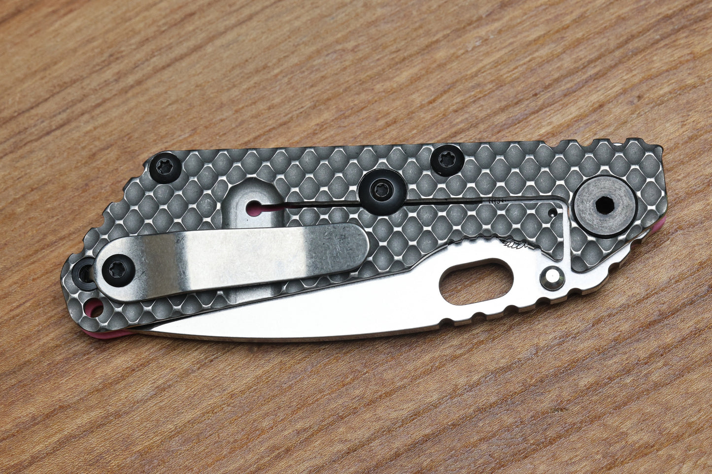 STRIDER KNIVES SNG TWO-TONE SATIN/ STONEWASHED MAGNACUT TANTO BLADE, PINK G10 GUNNER GRIP TOP, STONEWASHED GUNNER GRIP TITANIUM FRAME
