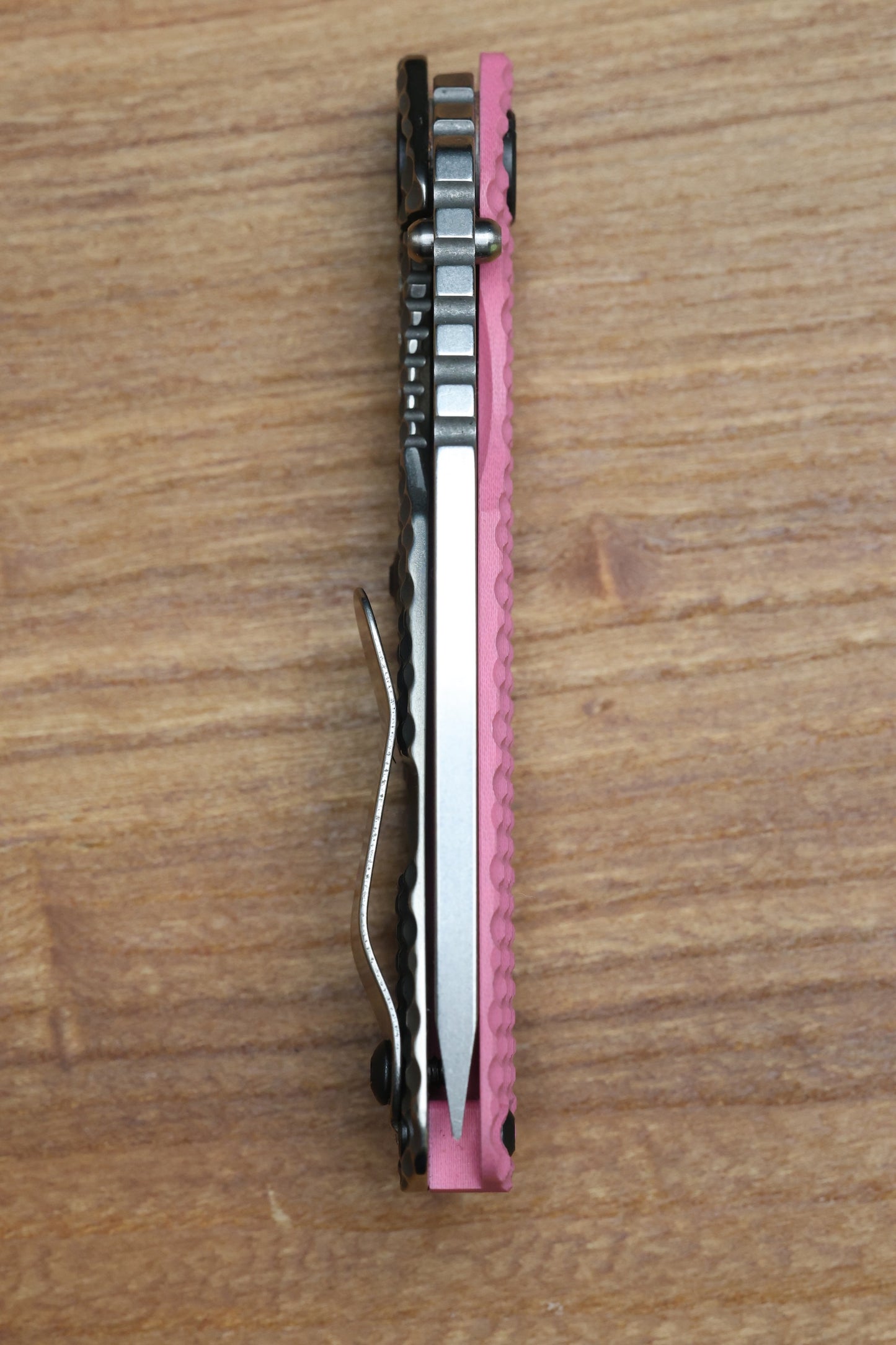 STRIDER KNIVES SNG TWO-TONE SATIN/ STONEWASHED MAGNACUT TANTO BLADE, PINK G10 GUNNER GRIP TOP, STONEWASHED GUNNER GRIP TITANIUM FRAME