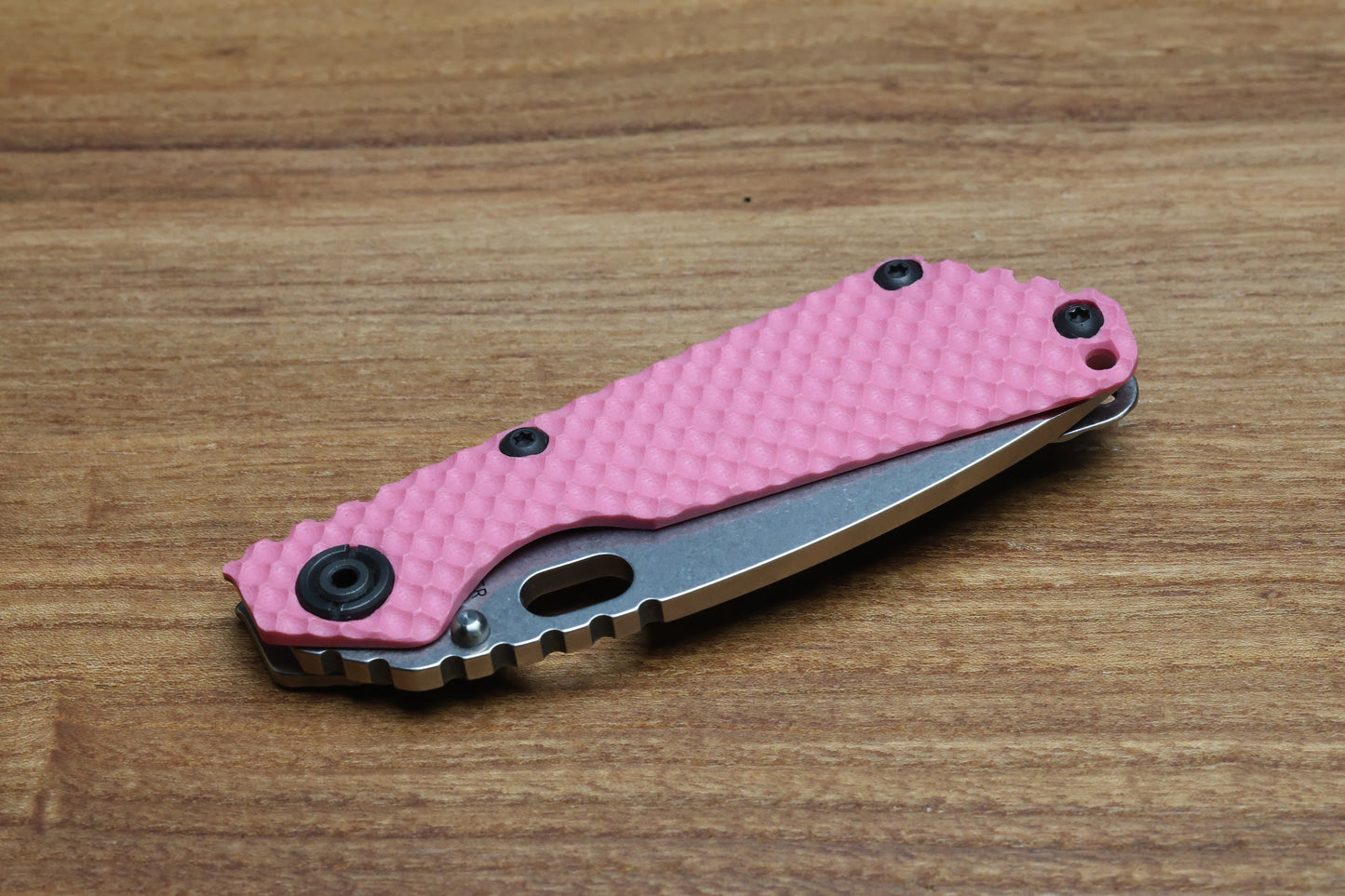 STRIDER KNIVES SNG TWO-TONE SATIN/ STONEWASHED MAGNACUT TANTO BLADE, PINK G10 GUNNER GRIP TOP, STONEWASHED GUNNER GRIP TITANIUM FRAME