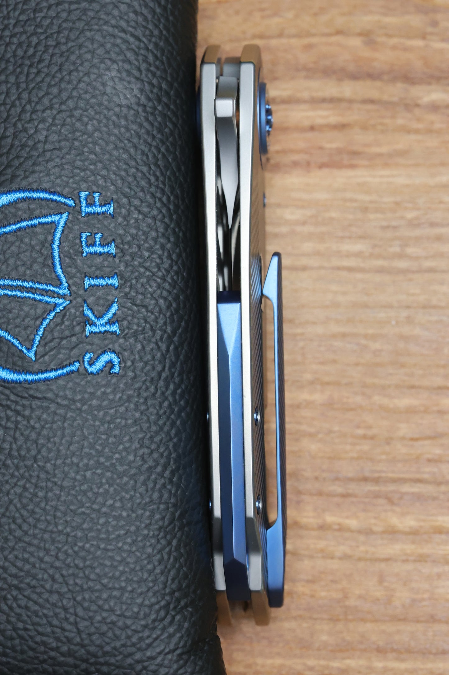 SKIFF MADE BLADES FUGITIVE- CPM154 BLADE, MILLED TITANIUM SCALES, ROYAL BLUE TI BACKSPACER, PIVOT COLLAR AND CLIP, #195