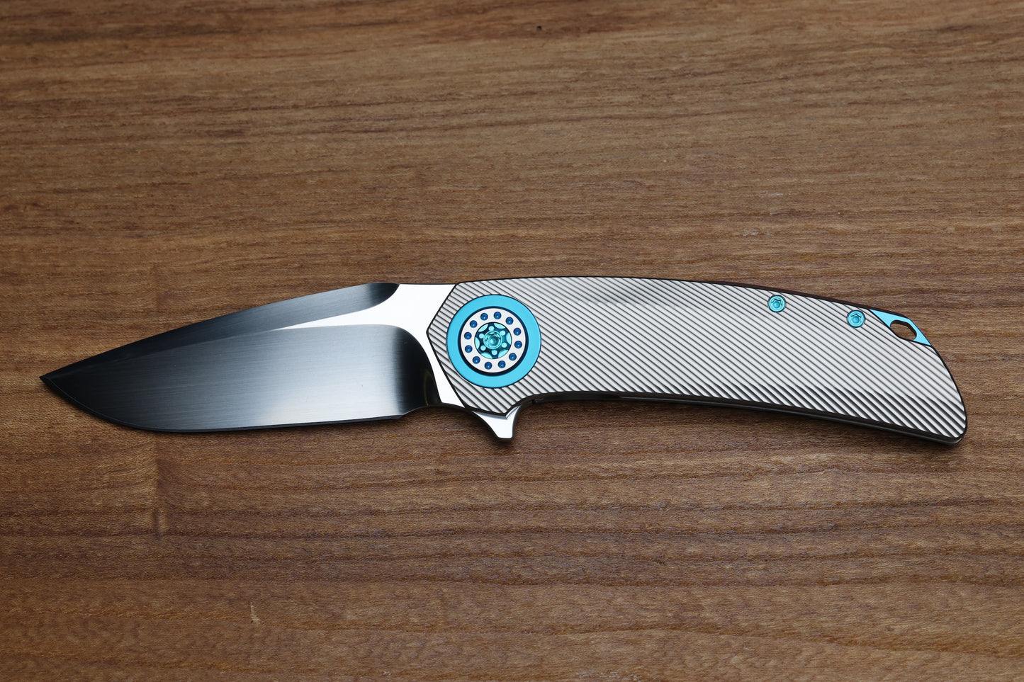 SKIFF MADE BLADES FUGITIVE- CPM154 BLADE, MILLED TITANIUM SCALES, SEA FOAM TI BACKSPACER, PIVOT COLLAR AND CLIP, #201