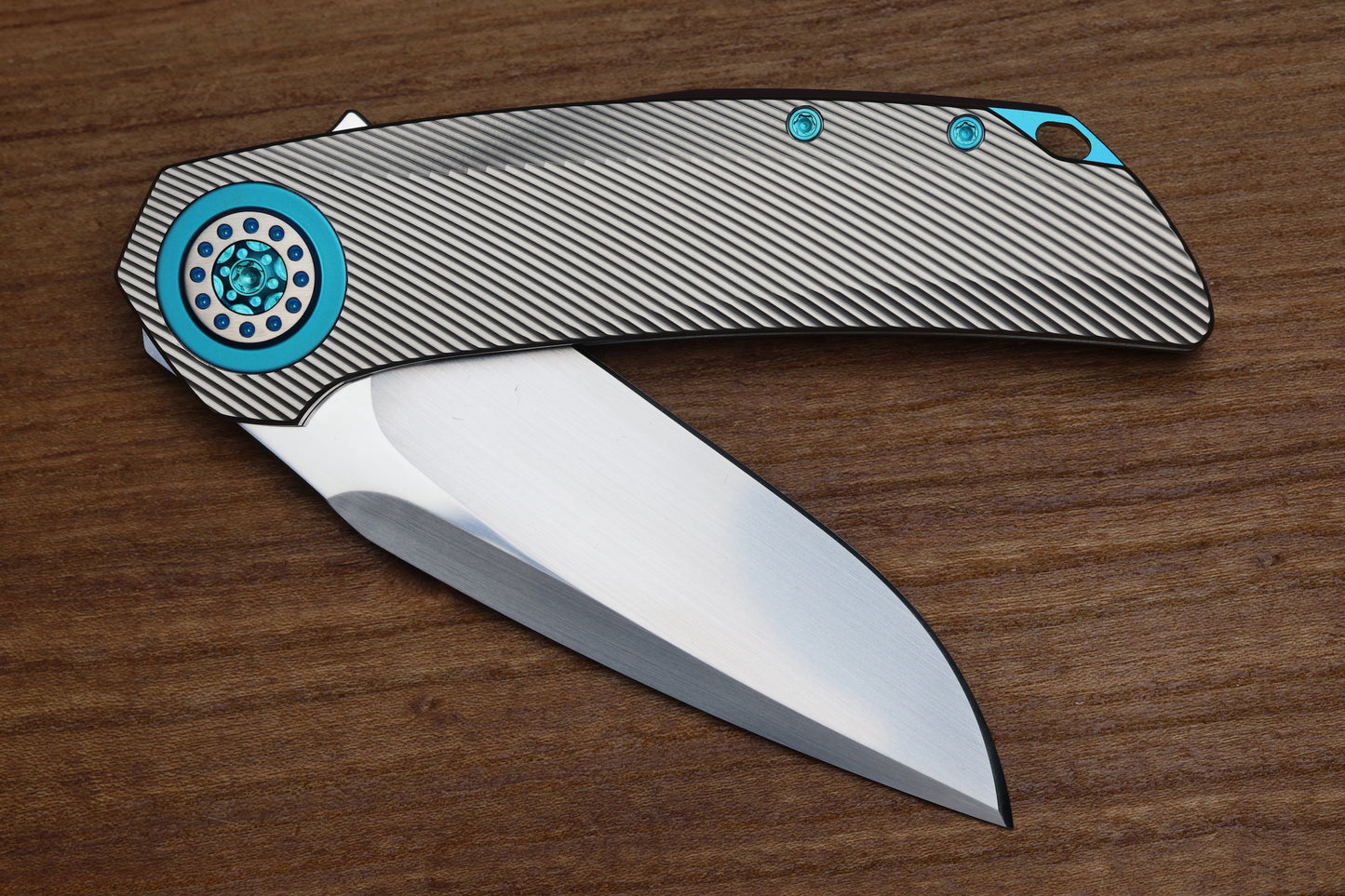 SKIFF MADE BLADES FUGITIVE- CPM154 BLADE, MILLED TITANIUM SCALES, SEA FOAM TI BACKSPACER, PIVOT COLLAR AND CLIP, #201