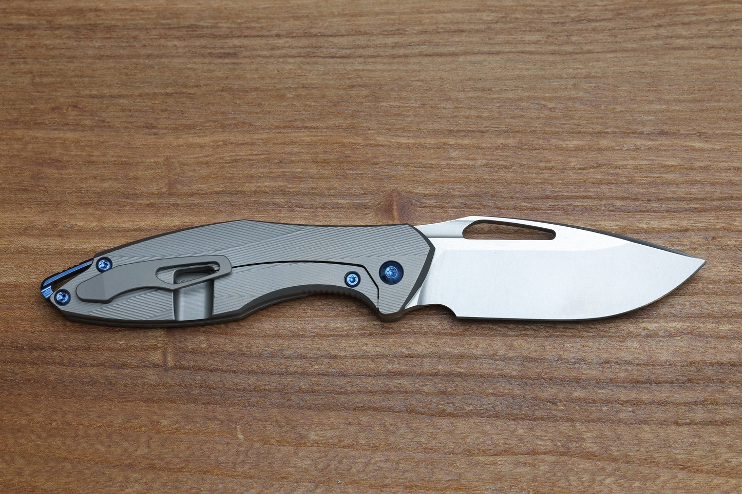 KOENIG KNIVES MINI ARIUS - NON FLIPPER - PATTERNED TITANIUM HANDLE - BLUE HARDWARE - BURNISHED W/ POLISHED FLATS M390 BLADE