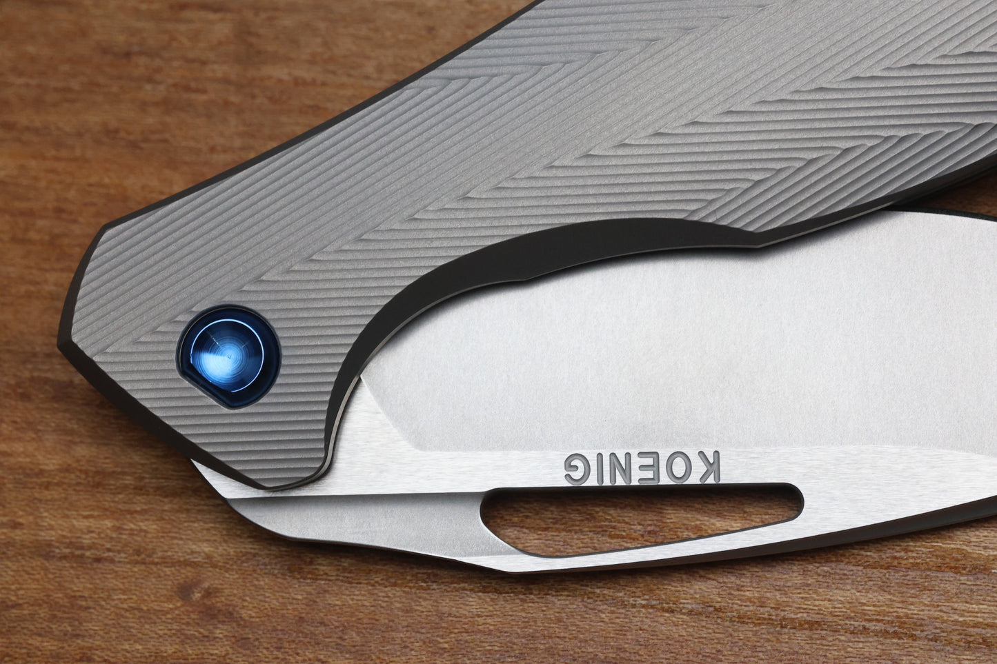 KOENIG KNIVES MINI ARIUS - NON FLIPPER - PATTERNED TITANIUM HANDLE - BLUE HARDWARE - BURNISHED W/ POLISHED FLATS M390 BLADE