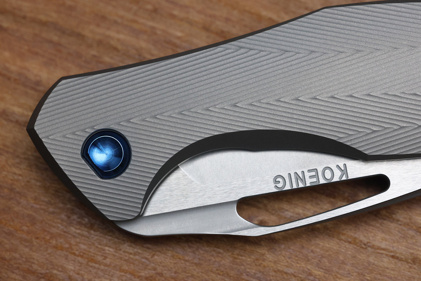 KOENIG KNIVES MINI ARIUS - NON FLIPPER - PATTERNED TITANIUM HANDLE - BLUE HARDWARE - BURNISHED W/ POLISHED FLATS M390 BLADE