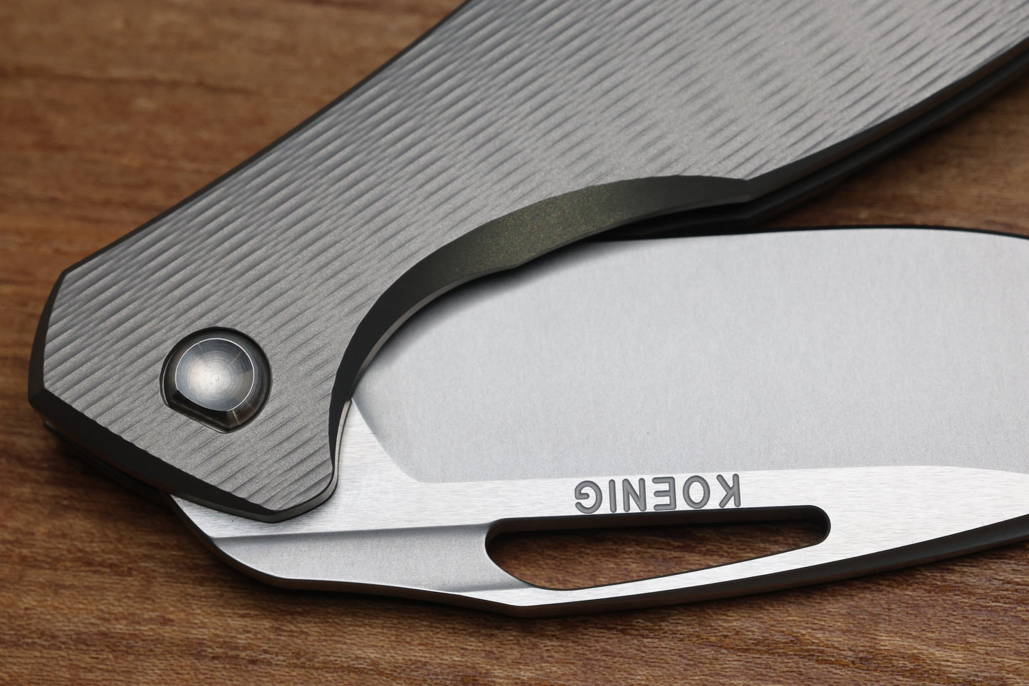 KOENIG KNIVES MINI ARIUS - NON FLIPPER - PLEXA TITANIUM HANDLE - SILVER HARDWARE - BURNISHED W/ POLISHED FLATS M390 BLADE