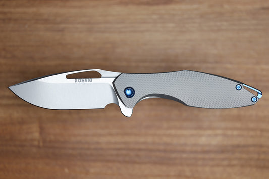 KOENIG MINI ARIUS - CORDA PATTERN TITANIUM HANDLE BLUE HARDWARE- M390 BLADE