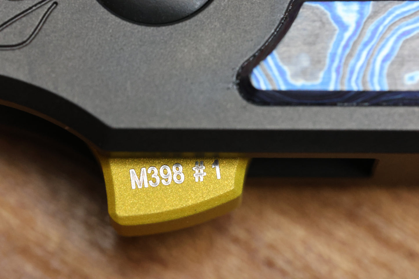 CUSTOM KNIFE FACTORY SNAFU 4.0 MEDIUM GOLD COATED BLADE & ZIRCUTI INLAYS