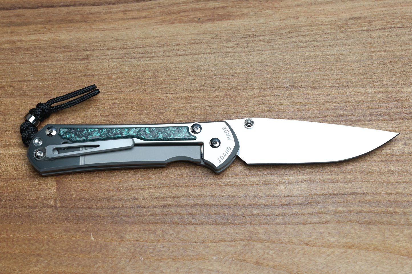 CHRIS REEVE LARGE SEBENZA 31 - TEAL MAGNETIC CARBOTI INLAY - POLISHED DROP POINT CPM MAGNACUT BLADE - SILVER DOUBLE LUGS - MIM CLIP