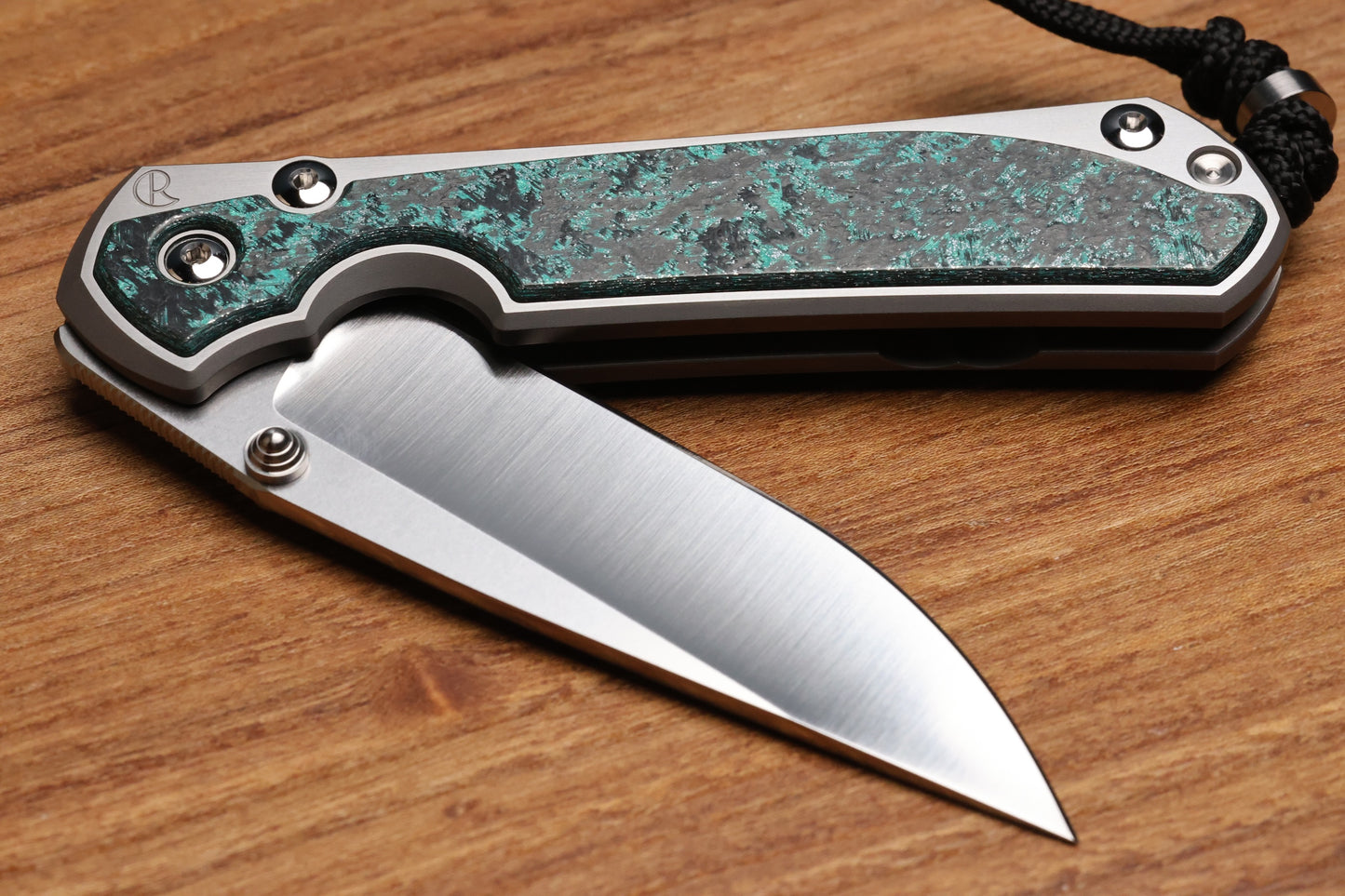 CHRIS REEVE LARGE SEBENZA 31 - TEAL MAGNETIC CARBOTI INLAY - POLISHED DROP POINT CPM MAGNACUT BLADE - SILVER DOUBLE LUGS - MIM CLIP