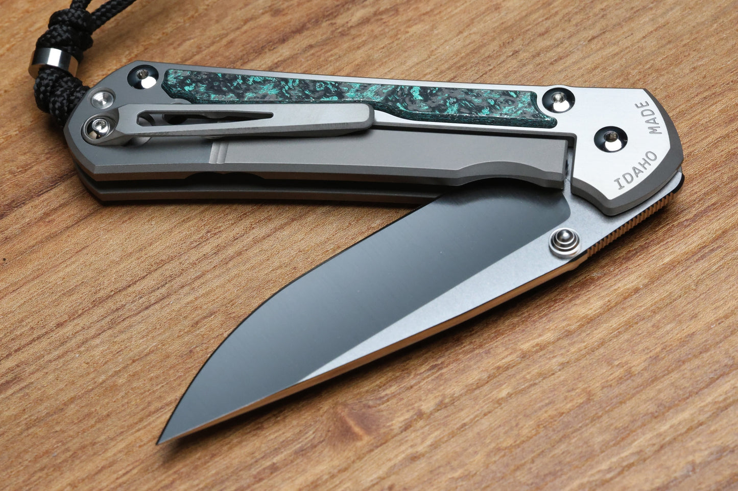 CHRIS REEVE LARGE SEBENZA 31 - TEAL MAGNETIC CARBOTI INLAY - POLISHED DROP POINT CPM MAGNACUT BLADE - SILVER DOUBLE LUGS - MIM CLIP