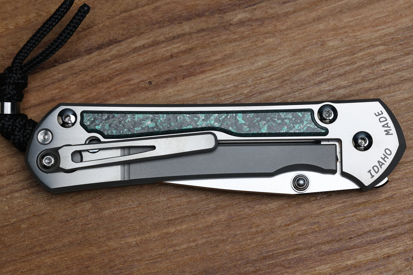 CHRIS REEVE LARGE SEBENZA 31 - TEAL MAGNETIC CARBOTI INLAY - POLISHED DROP POINT CPM MAGNACUT BLADE - SILVER DOUBLE LUGS - MIM CLIP