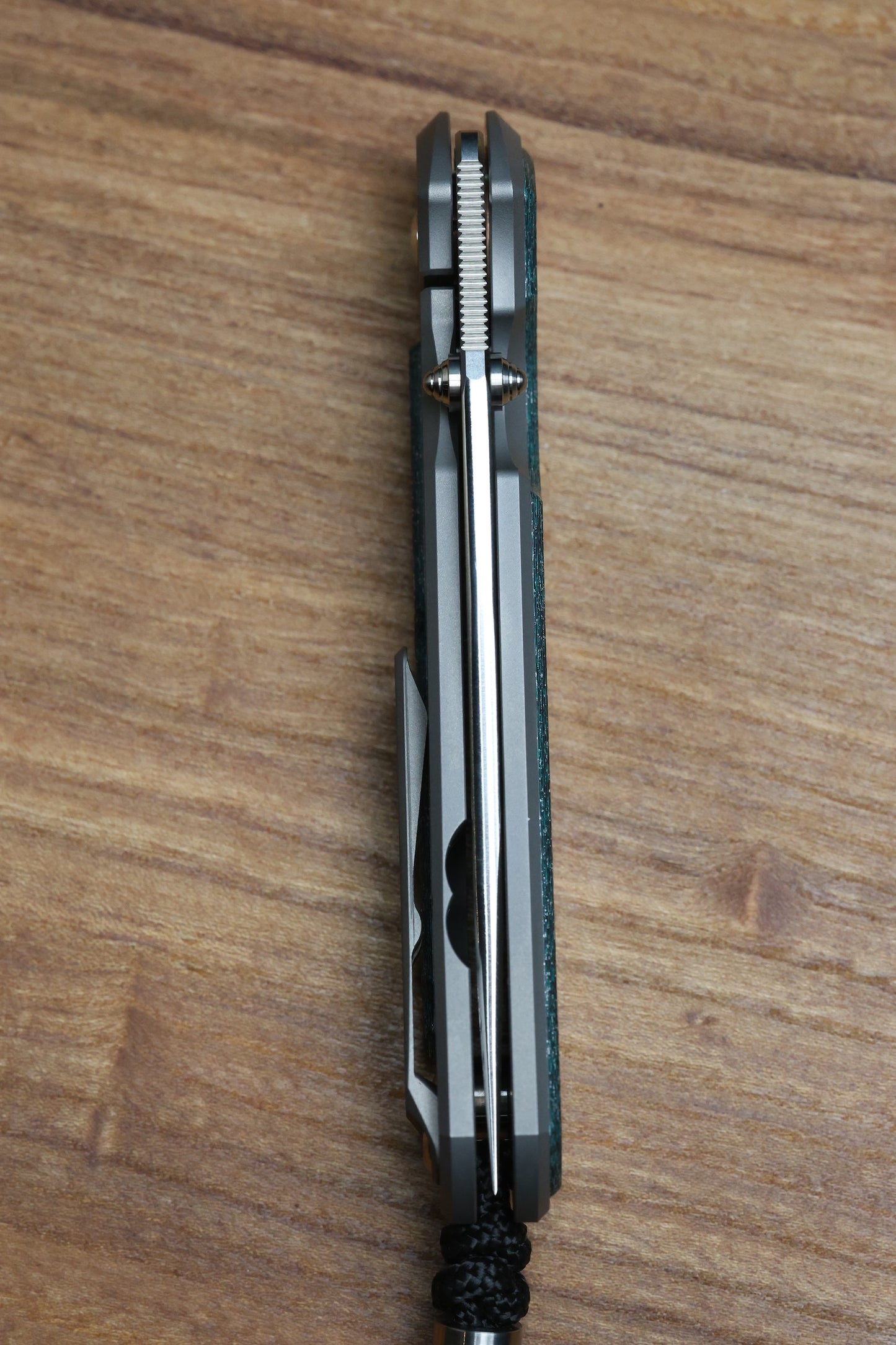 CHRIS REEVE LARGE SEBENZA 31 - TEAL MAGNETIC CARBOTI INLAY - POLISHED DROP POINT CPM MAGNACUT BLADE - SILVER DOUBLE LUGS - MIM CLIP