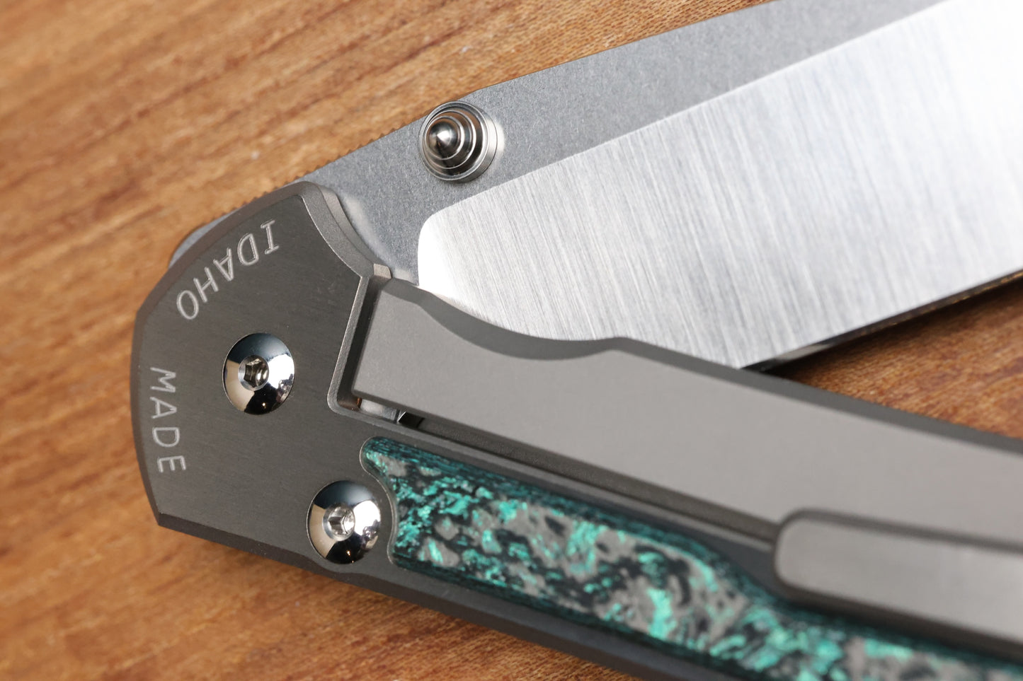 CHRIS REEVE LARGE SEBENZA 31 - TEAL MAGNETIC CARBOTI INLAY - POLISHED DROP POINT CPM MAGNACUT BLADE - SILVER DOUBLE LUGS - MIM CLIP