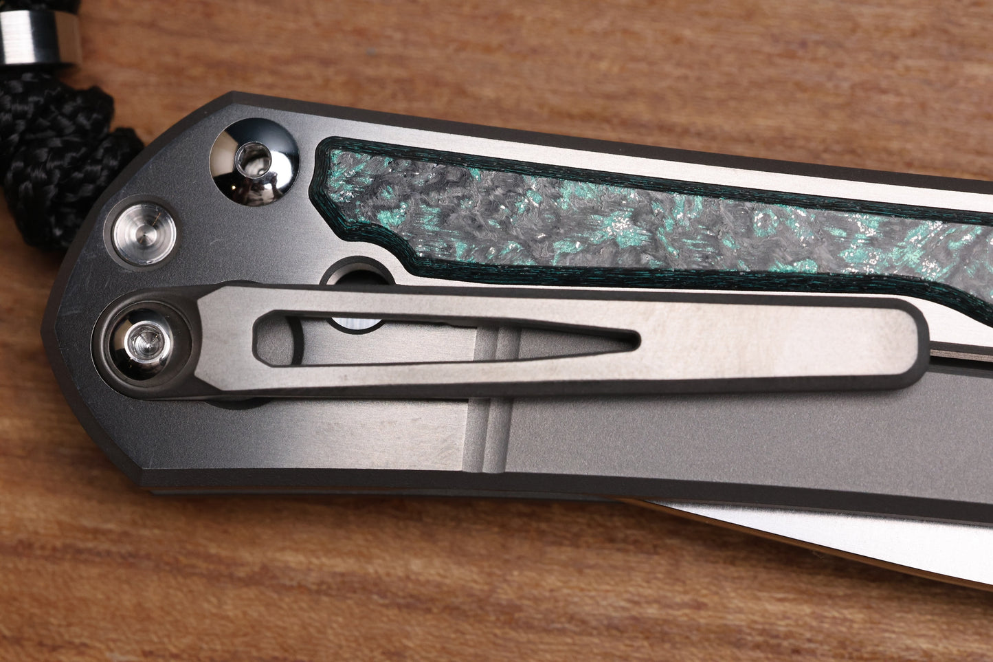CHRIS REEVE LARGE SEBENZA 31 - TEAL MAGNETIC CARBOTI INLAY - POLISHED DROP POINT CPM MAGNACUT BLADE - SILVER DOUBLE LUGS - MIM CLIP