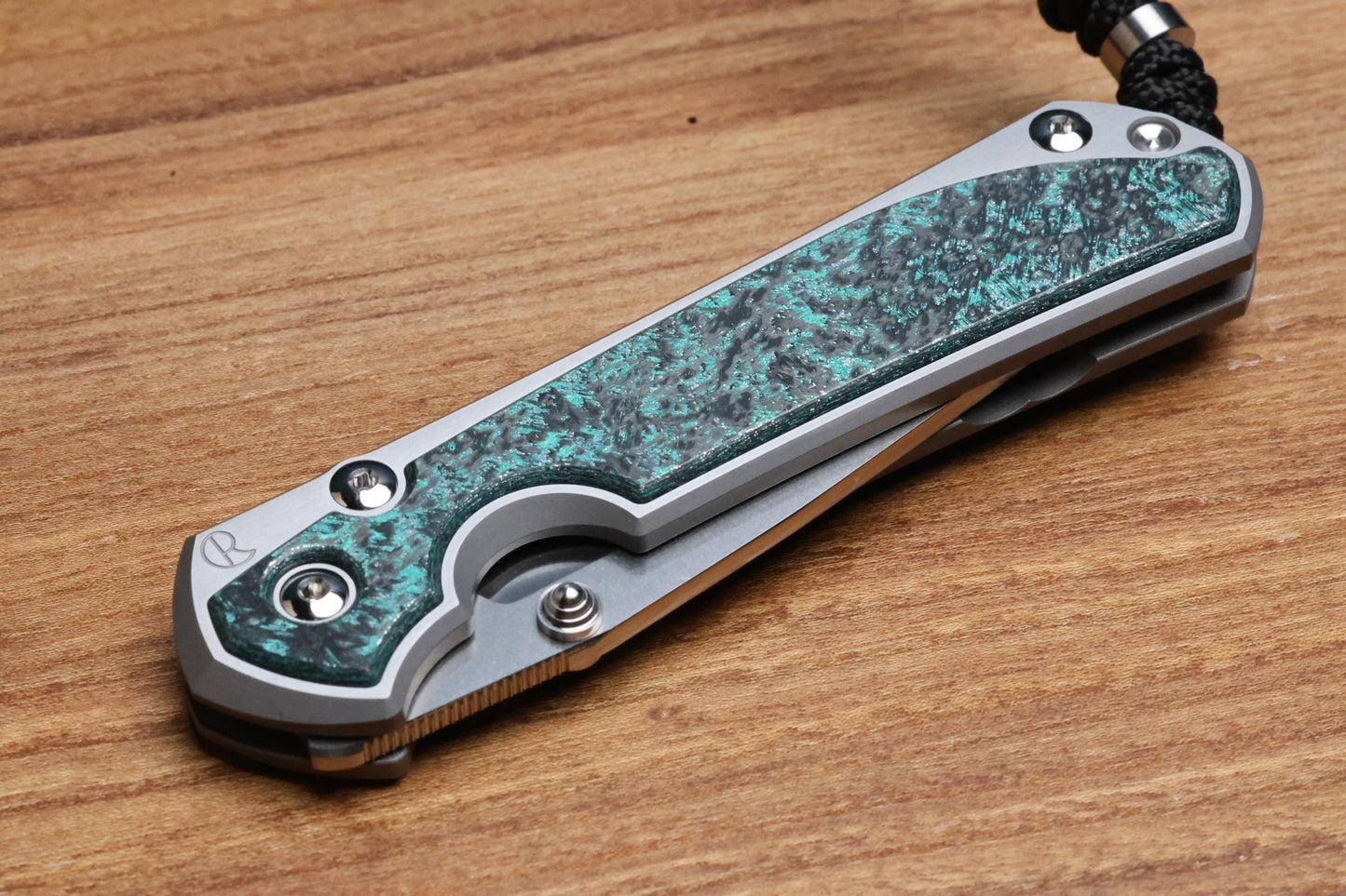 CHRIS REEVE LARGE SEBENZA 31 - TEAL MAGNETIC CARBOTI INLAY - POLISHED DROP POINT CPM MAGNACUT BLADE - SILVER DOUBLE LUGS - MIM CLIP