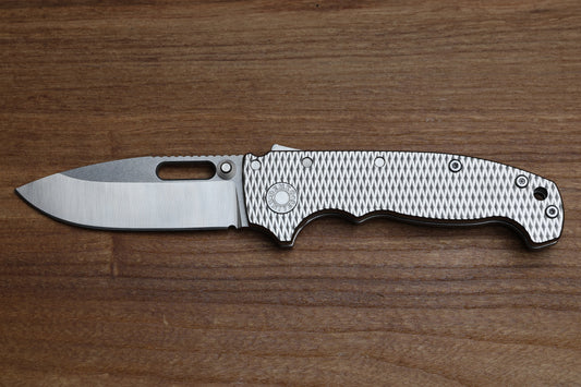 DEMKO KNIVES MG AD20 DROP POINT TWO TONE MAGNACUT & TEXTURED TITANIUM