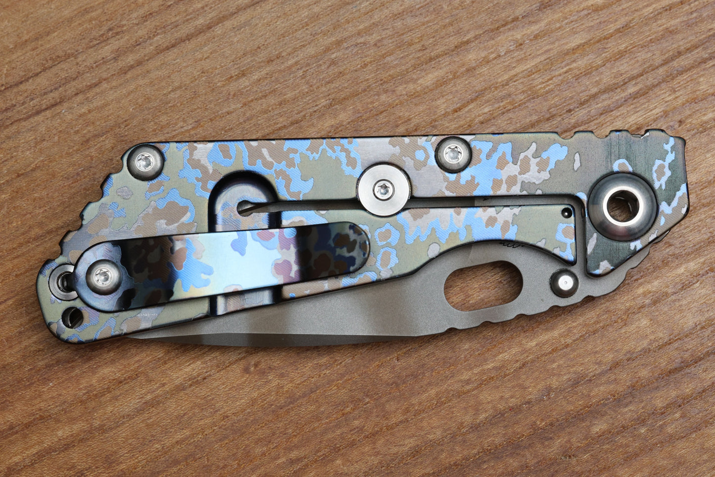 STRIDER KNIVES SNG PARTIZAN CAMO TITANIUM HANDLE W/PARTIZAN CAMO CLIP-TIGER STRIPE MAGNACUT DROP POINT BLADE,