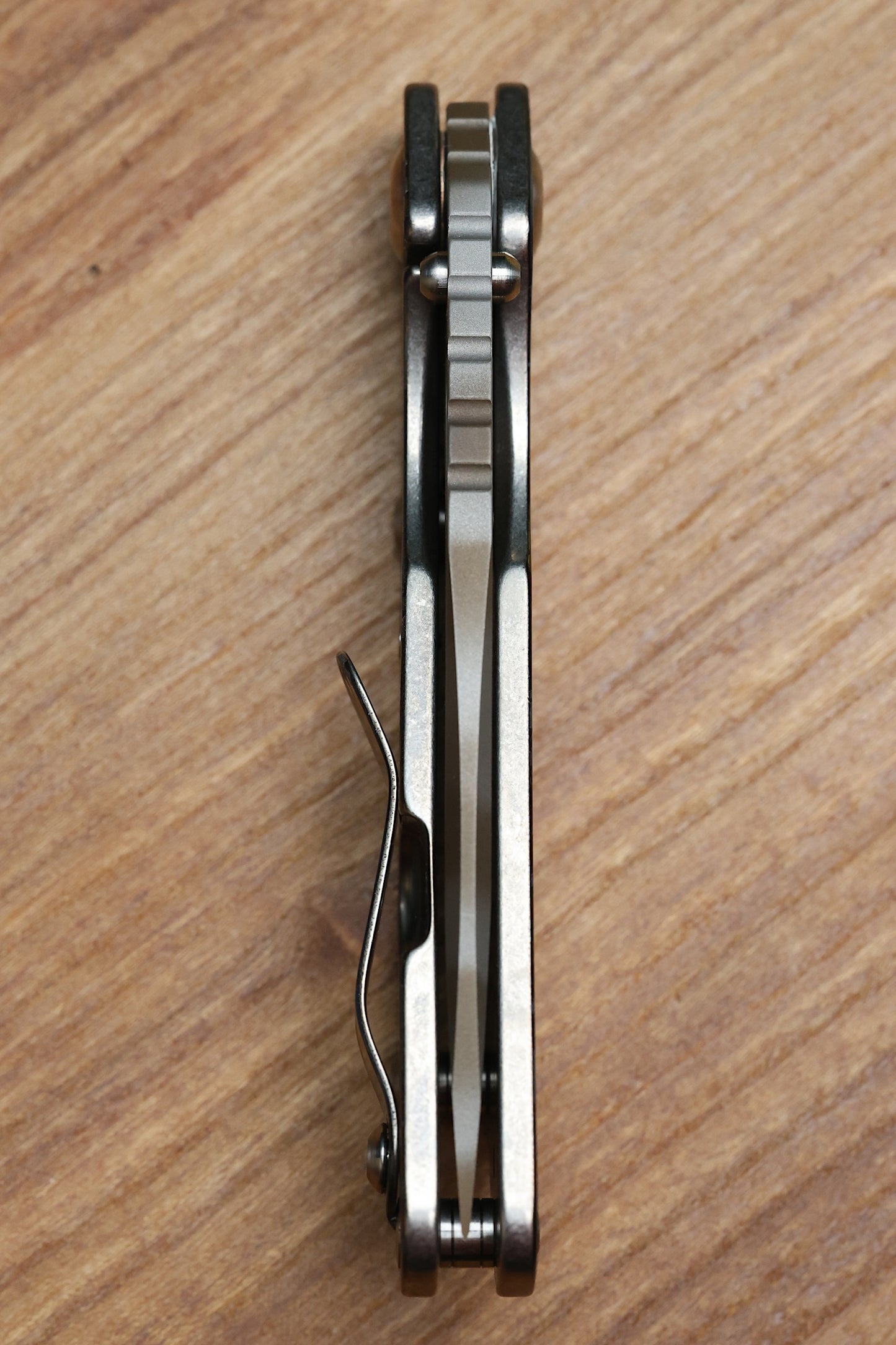 STRIDER KNIVES SNG PARTIZAN CAMO TITANIUM HANDLE W/PARTIZAN CAMO CLIP-TIGER STRIPE MAGNACUT DROP POINT BLADE,