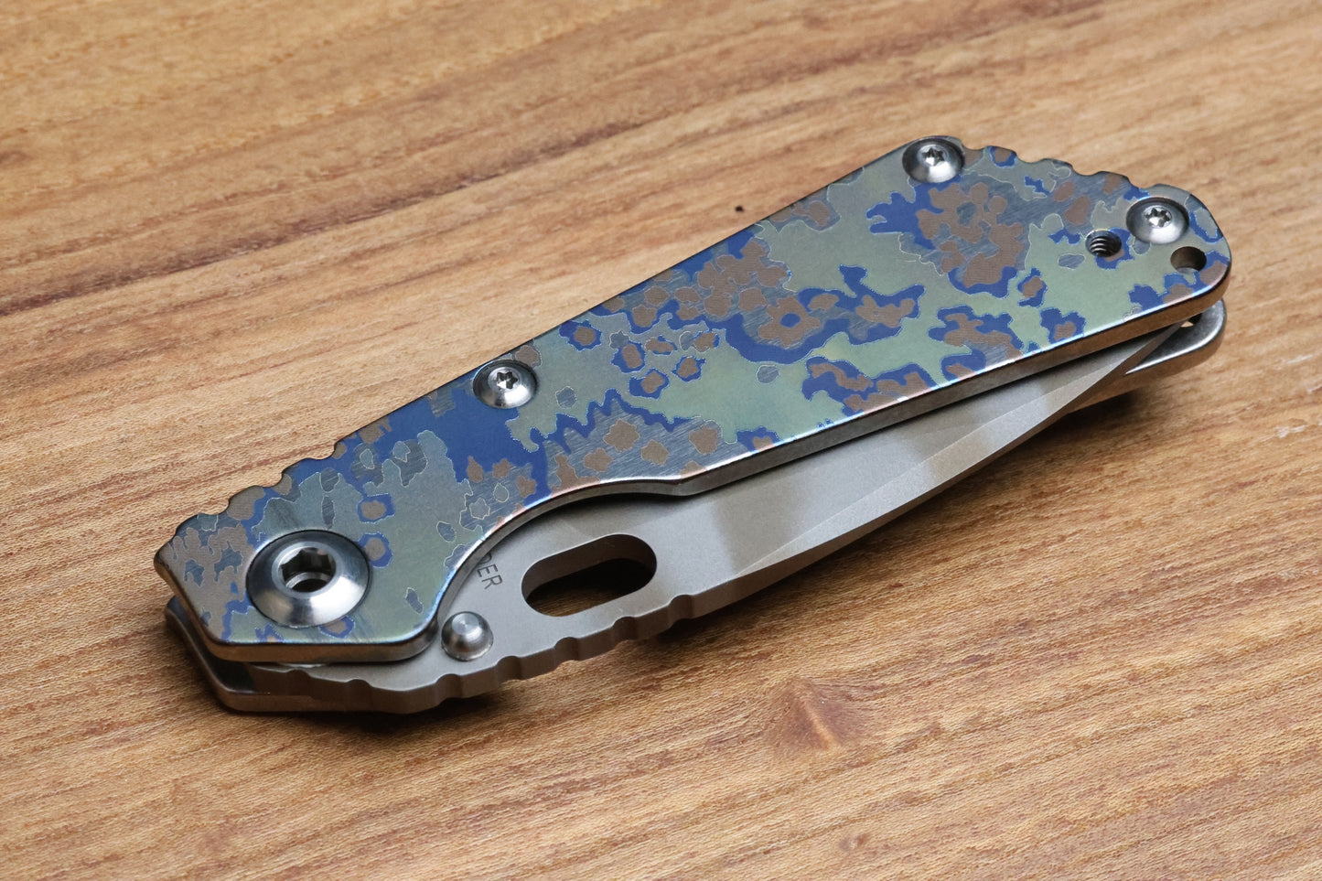 STRIDER KNIVES SNG PARTIZAN CAMO TITANIUM HANDLE W/PARTIZAN CAMO CLIP-TIGER STRIPE MAGNACUT DROP POINT BLADE,