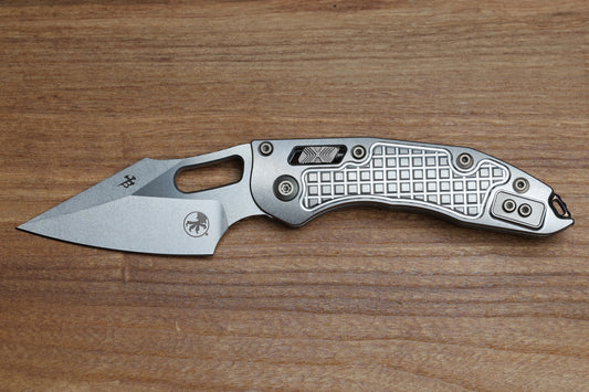 MICROTECH MARFIONE SELECT STITCH - RAM-LOK STONEWASH FINISH FRAG PATTERN TITANIUM W/ FLAMED TITANIUM ACCENT 169RL-10FRMS4