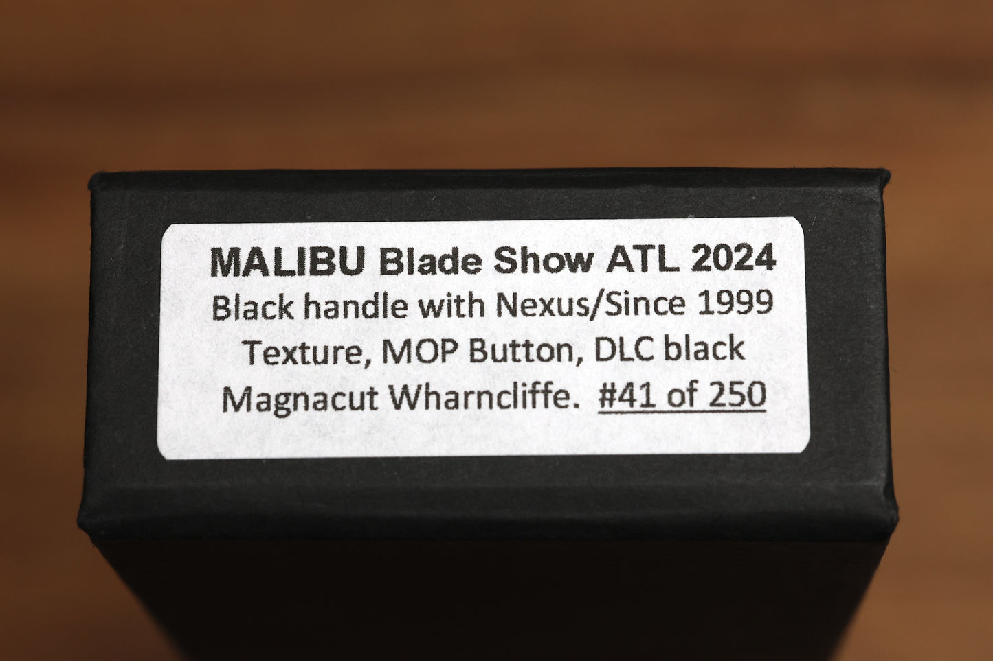 PRO-TECH KNIVES MALIBU FLIPPER - BLADE SHOW ATL 2024 - BLACK HANDLE W/ NEXUS/SINCE 1999 TEXTURE, MOP BUTTON, DLC MAGNACUT WHARNCLIFFE BLADE