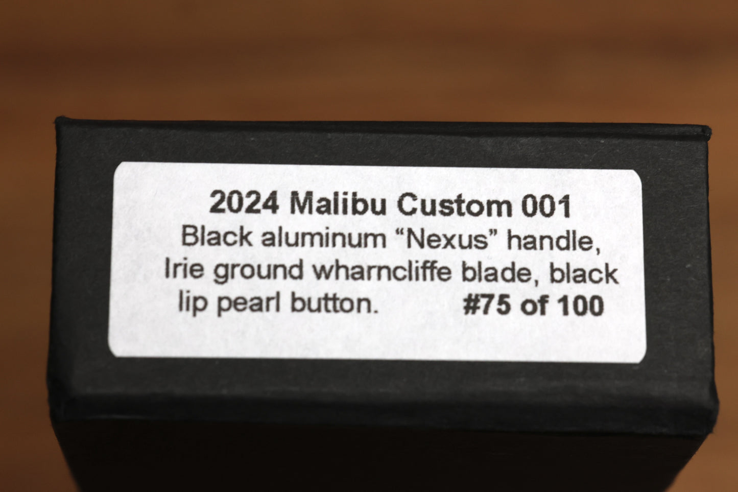 PRO-TECH KNIVES MALIBU FLIPPER CUSTOM 001 - BLACK ALUMINUM "NEXUS" HANDLE, IRIE GROUND WHARNCLIFFE BLADE, BLACK LIP PEARL BUTTON