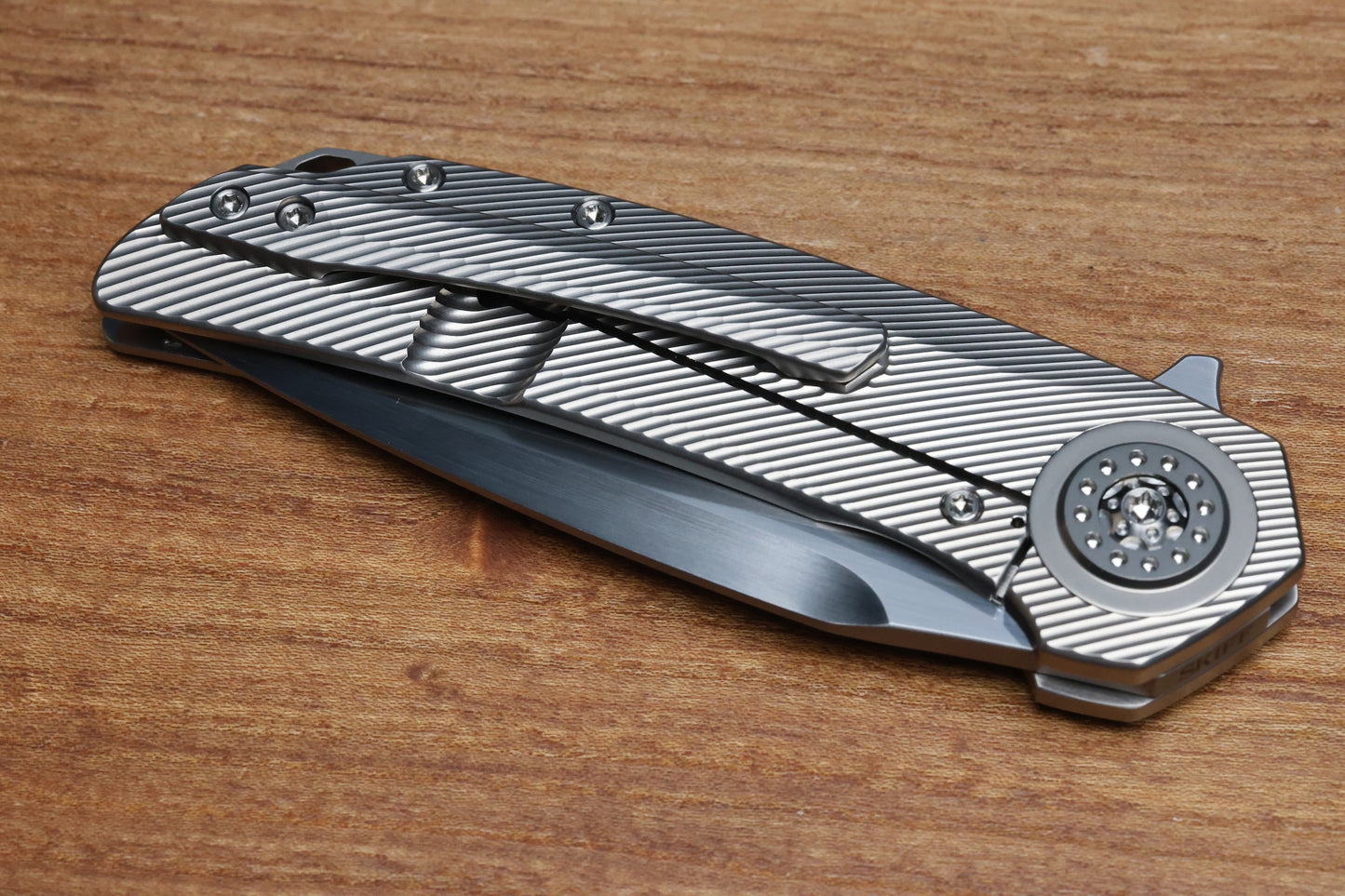 SKIFF MADE BLADES FUGITIVE MILLED TITANIUM SCALES TITANIUM HARDWARE SATIN CPM154 BLADE #227 (PREOWNED)