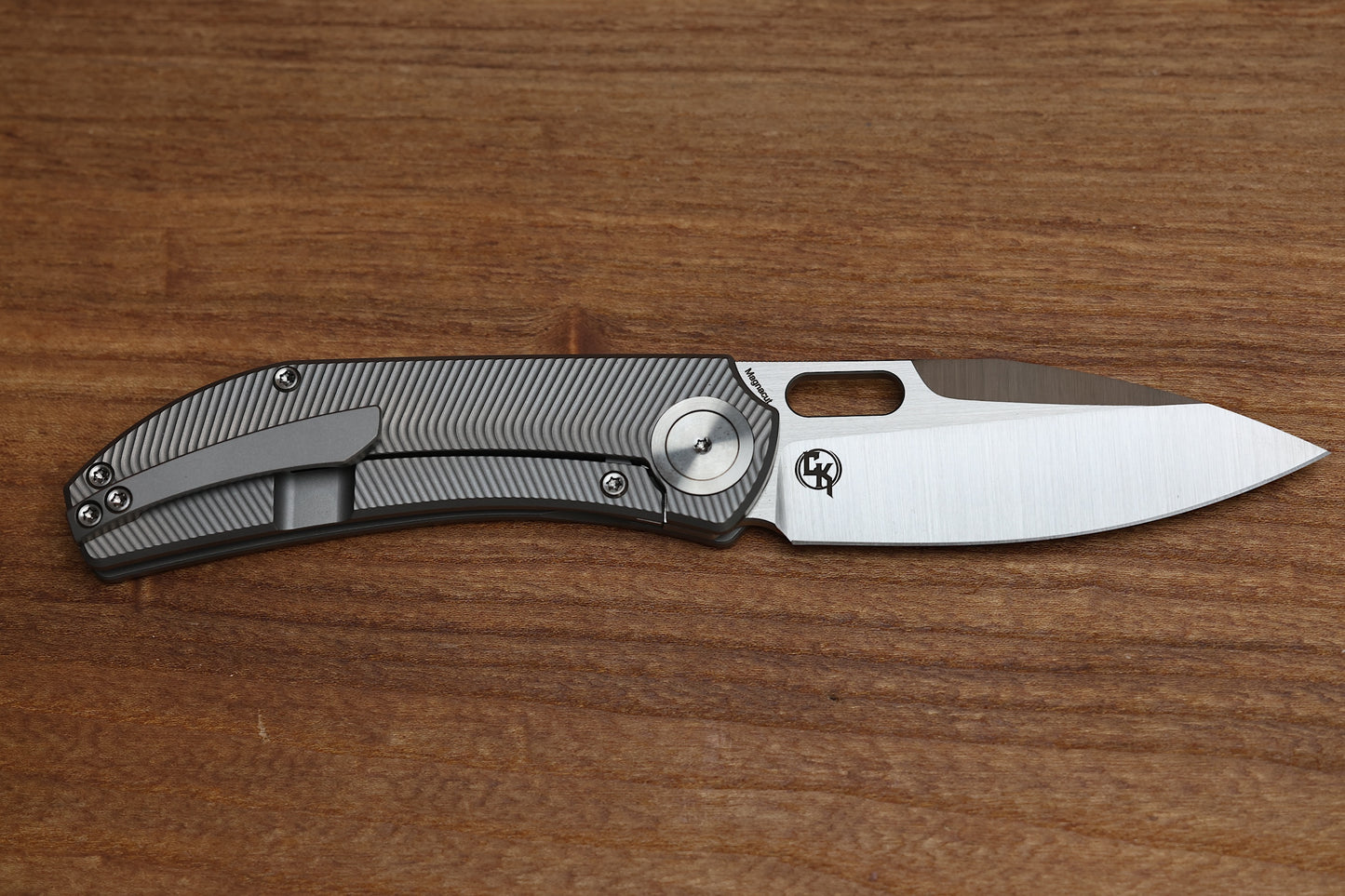 YAN’S CHEVRON- FULL TITANIUM FRONT FLIPPER WITH THUMB HOLE