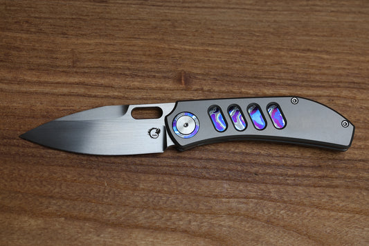 YAN’S CHEVRON- TITANIUM FRONT FLIPPER WITH ZIRCUTI INLAY THUMB HOLE