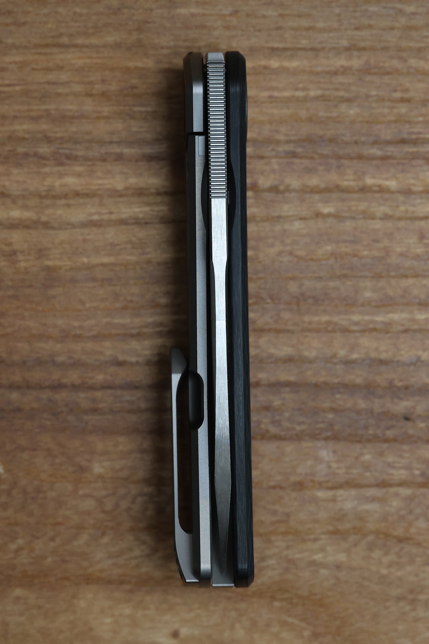 YAN’S CHEVRON- TITANIUM FRONT FLIPPER WITH WEAVE CF THUMB HOLE