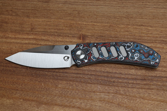 YAN’S CHEVRON- TITANIUM FRONT FLIPPER WITH NEBULA CF THUMB STUD