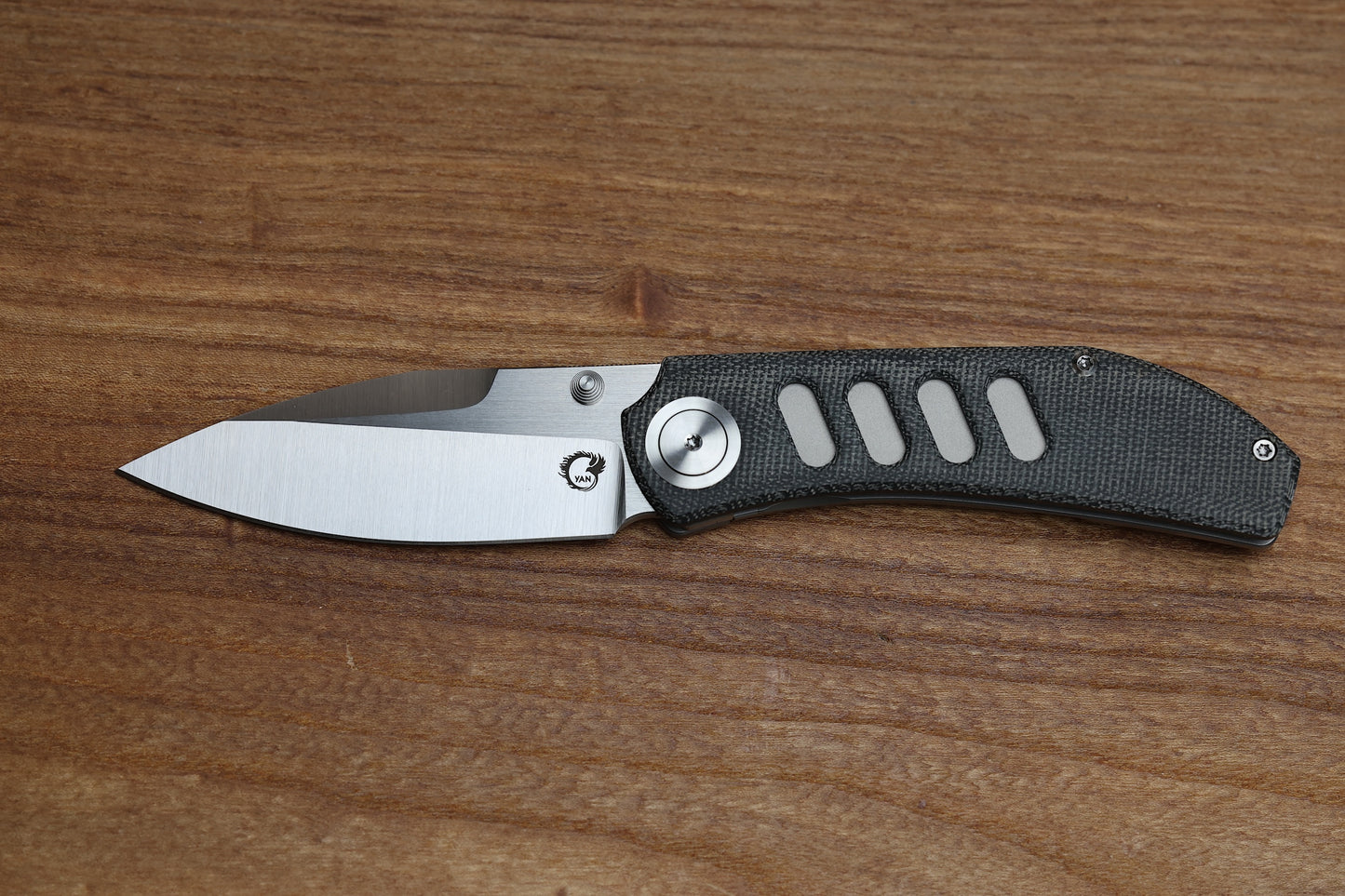 YAN’S CHEVRON- TITANIUM FRONT FLIPPER WITH BLACK MICARTA THUMB STUD