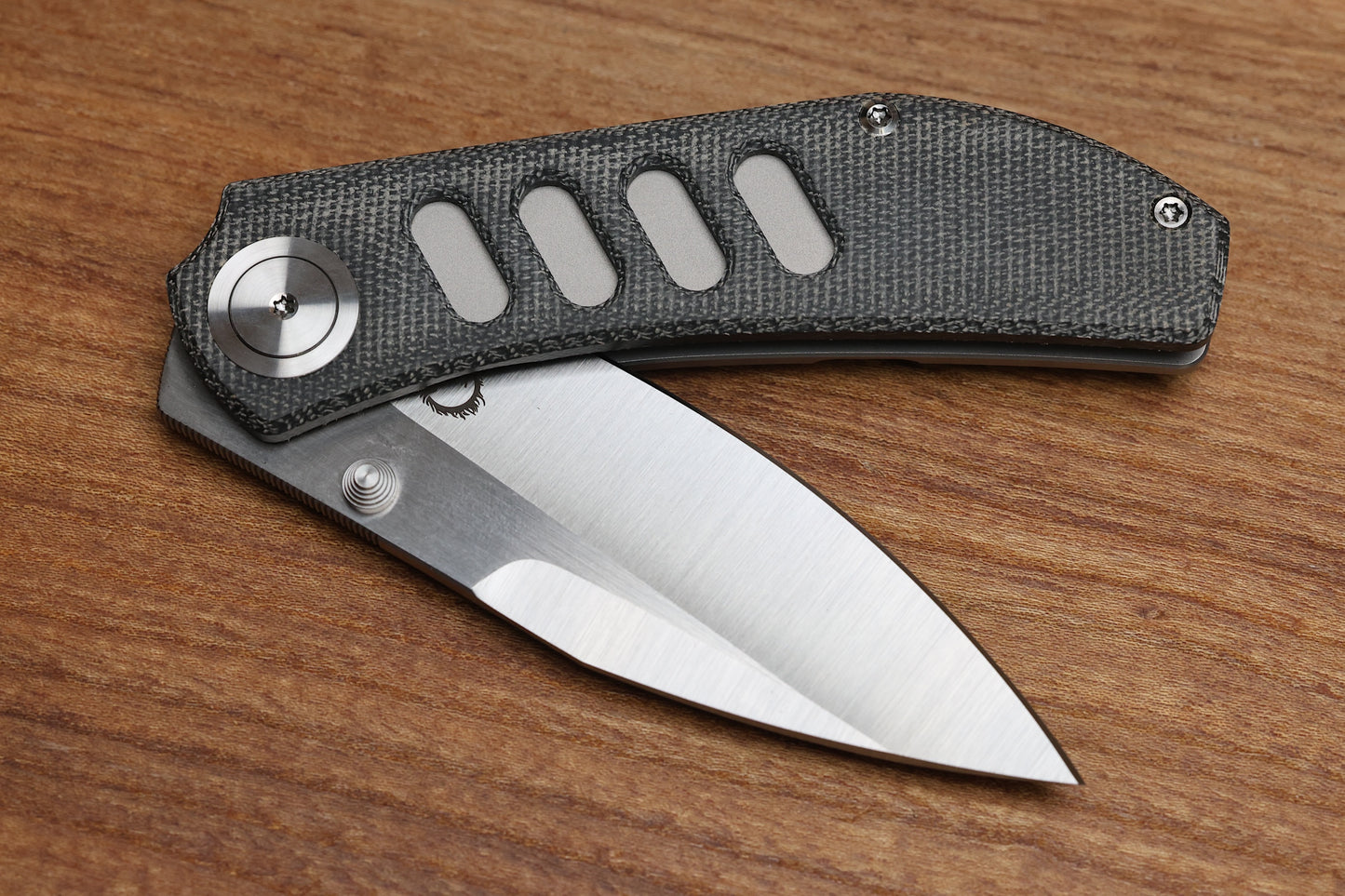 YAN’S CHEVRON- TITANIUM FRONT FLIPPER WITH BLACK MICARTA THUMB STUD